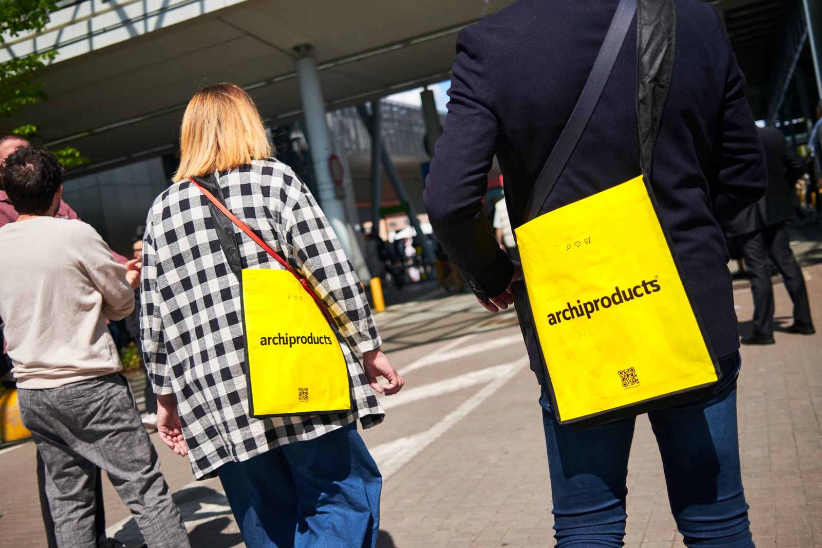 Archiproducts yellow bags among Milan Design Week visitors
