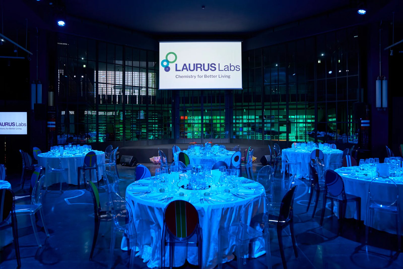 Evening venue with Laurus Labs branding
