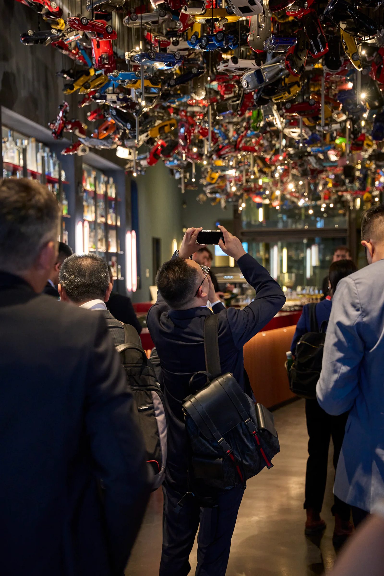 Guests at the bar during the drinks reception